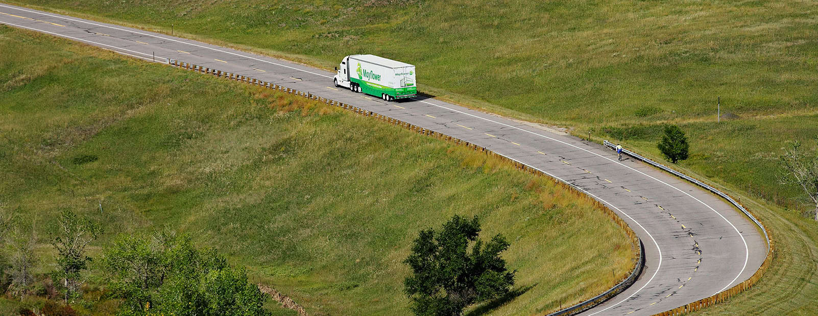 Mayflower Moving Truck on Curved Road