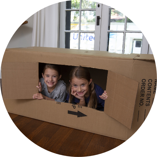 Kids Playing in Boxes